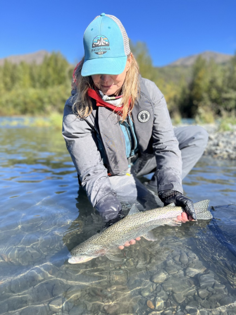 an angler wearing layered clothing on the Kenai River