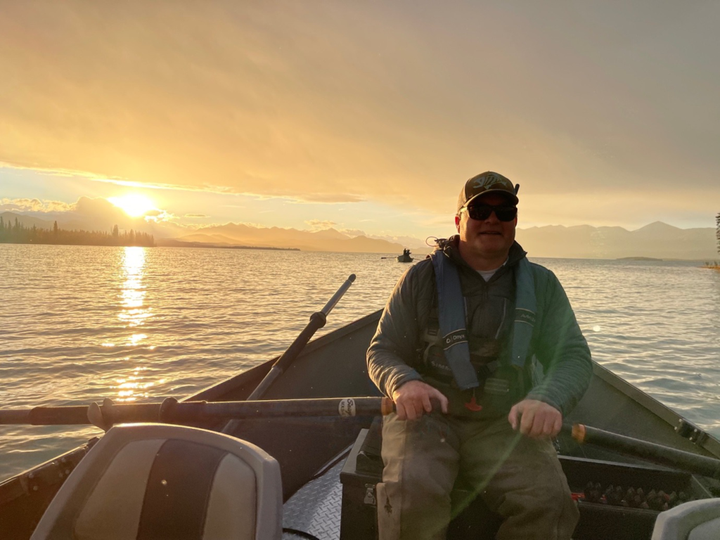 fishing guide Jason Lesmeister reading the water during his Kenai River fishing trip