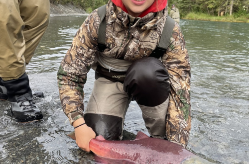 girl-holding-pink-salmon-Kenai-River