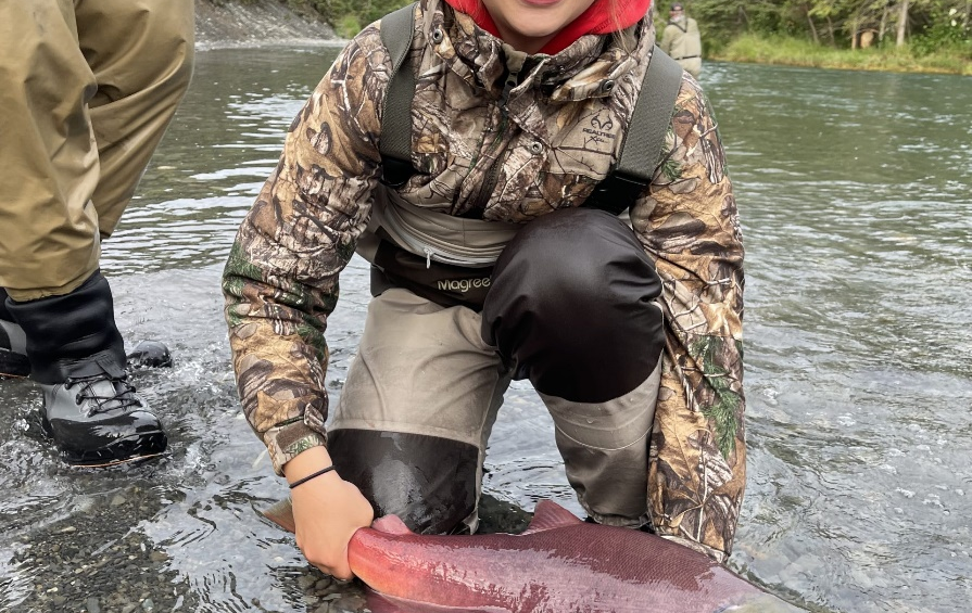 girl-holding-pink-salmon-Kenai-River